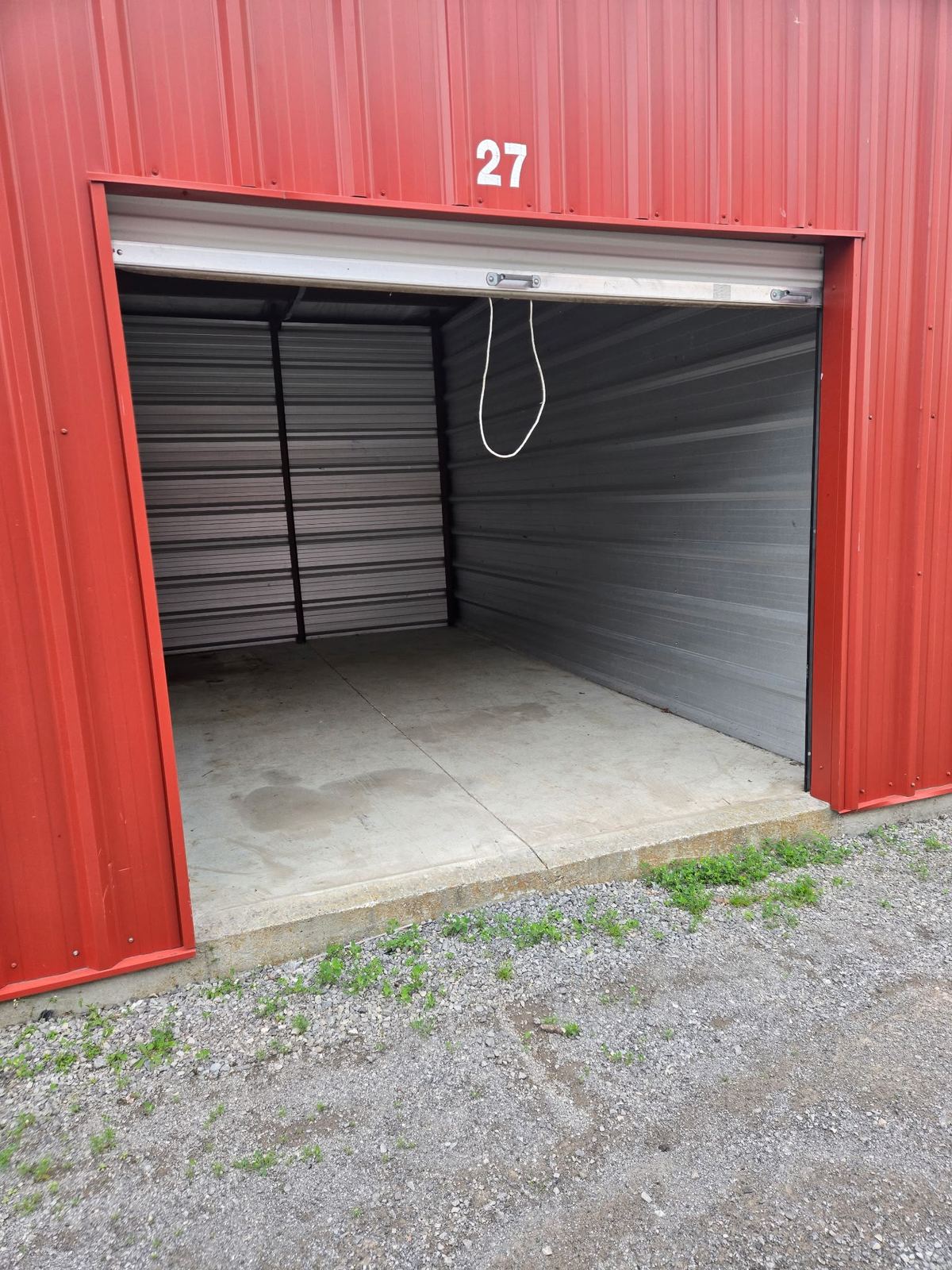 An open self-storage unit door showing the clean interior space at Osgoode Storage.
